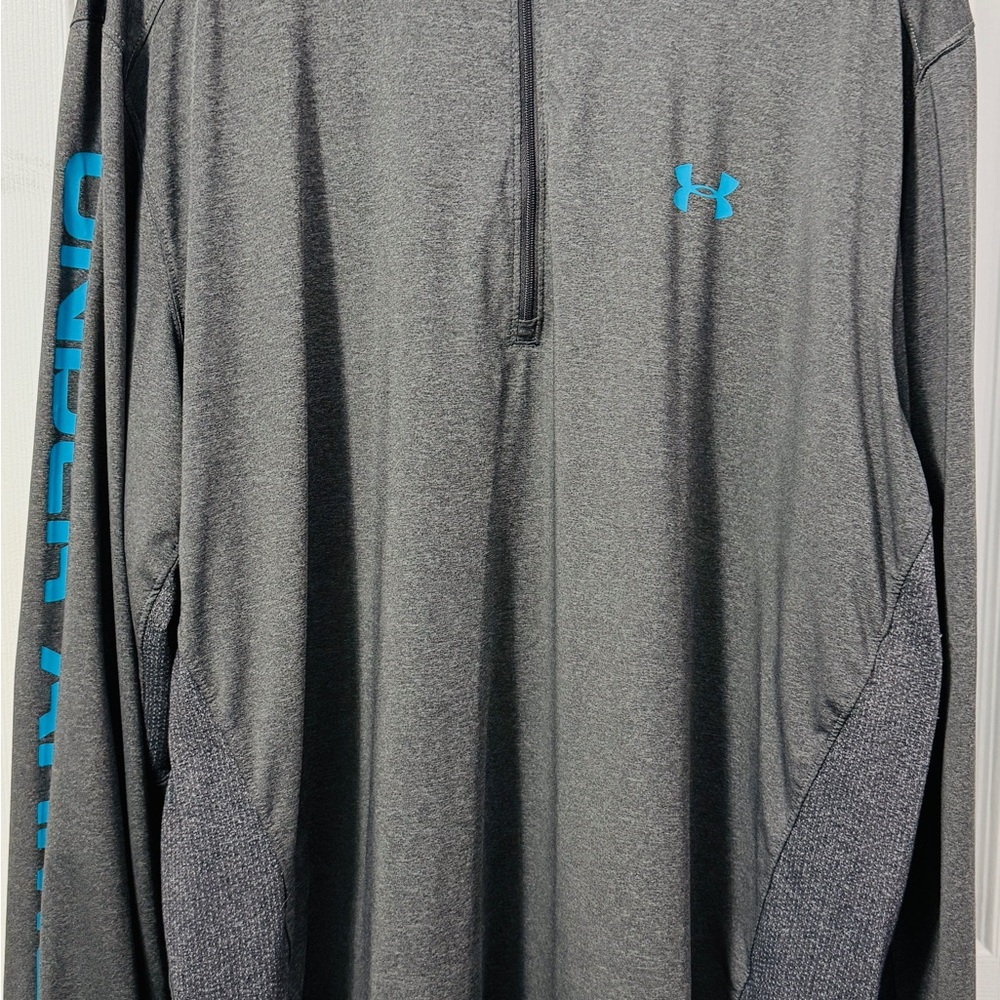 Under Armour gray 1/4 zip pullover with a blue fishing hook logo